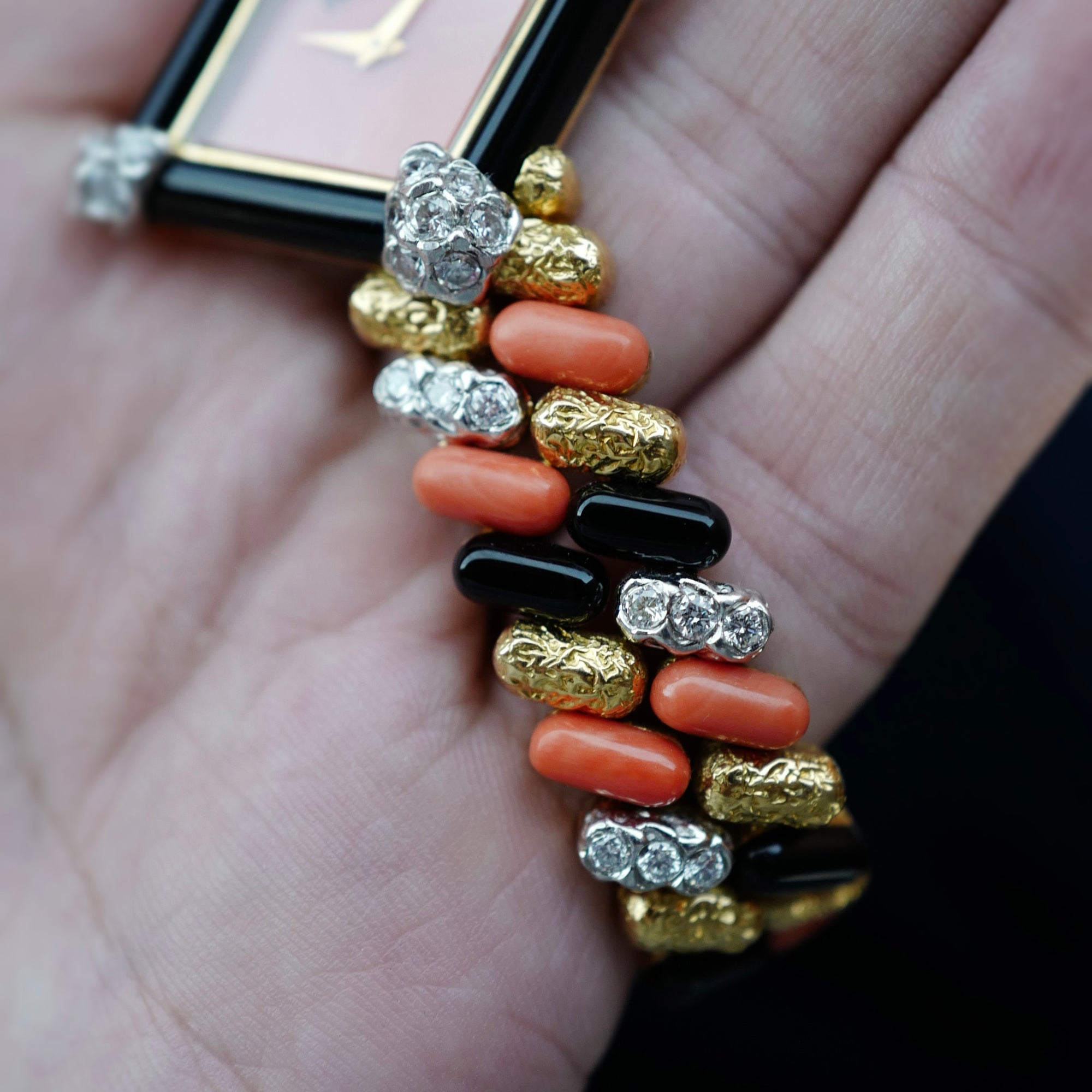 Piaget Yellow Gold Coral, Onyx, Diamond Watch, Circa 1970s