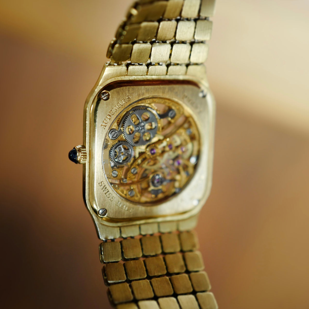 Audemars Piguet Yellow Gold Square Skeleton Watch with Diamonds, Emeralds and Rubies