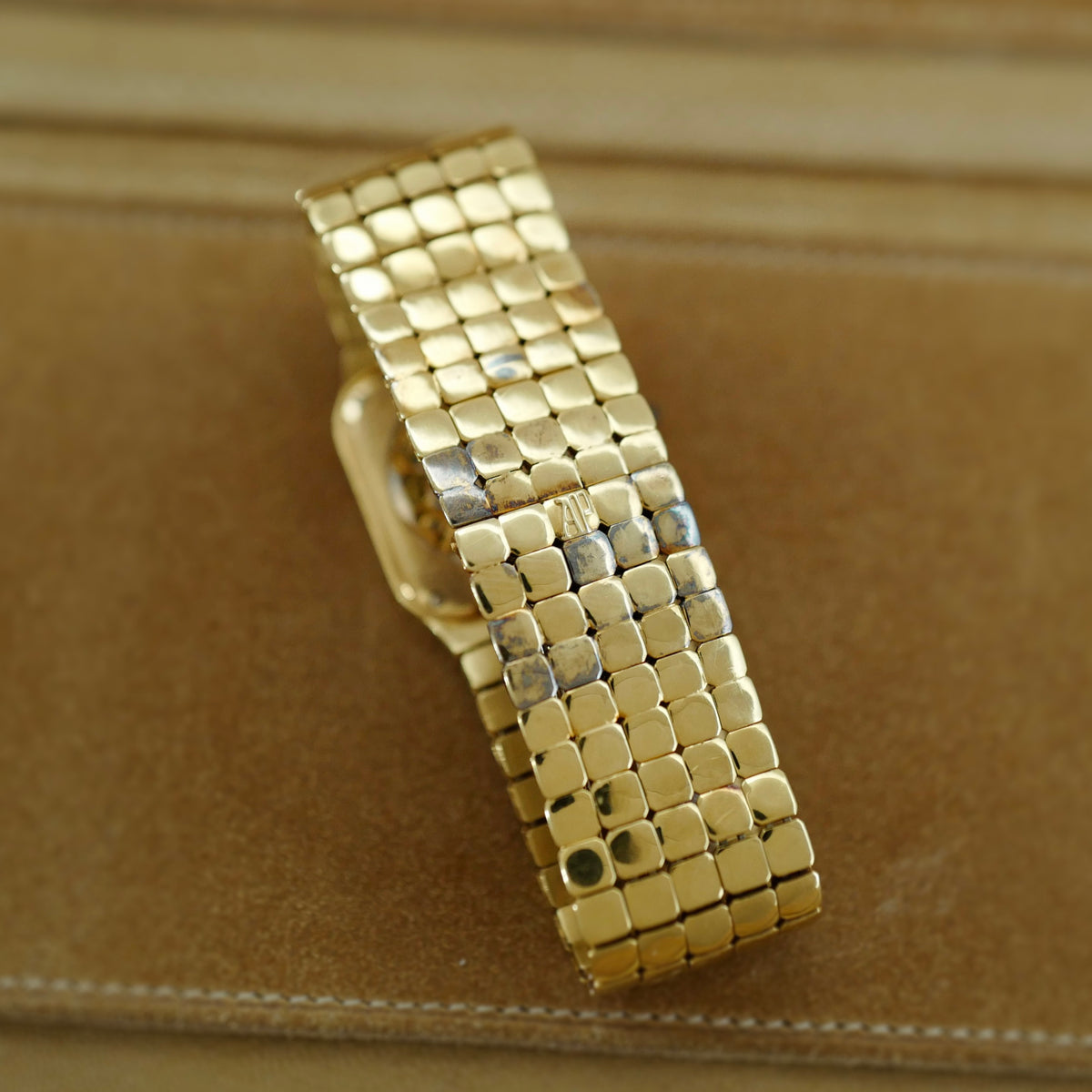 Audemars Piguet Yellow Gold Square Skeleton Watch with Diamonds, Emeralds and Rubies