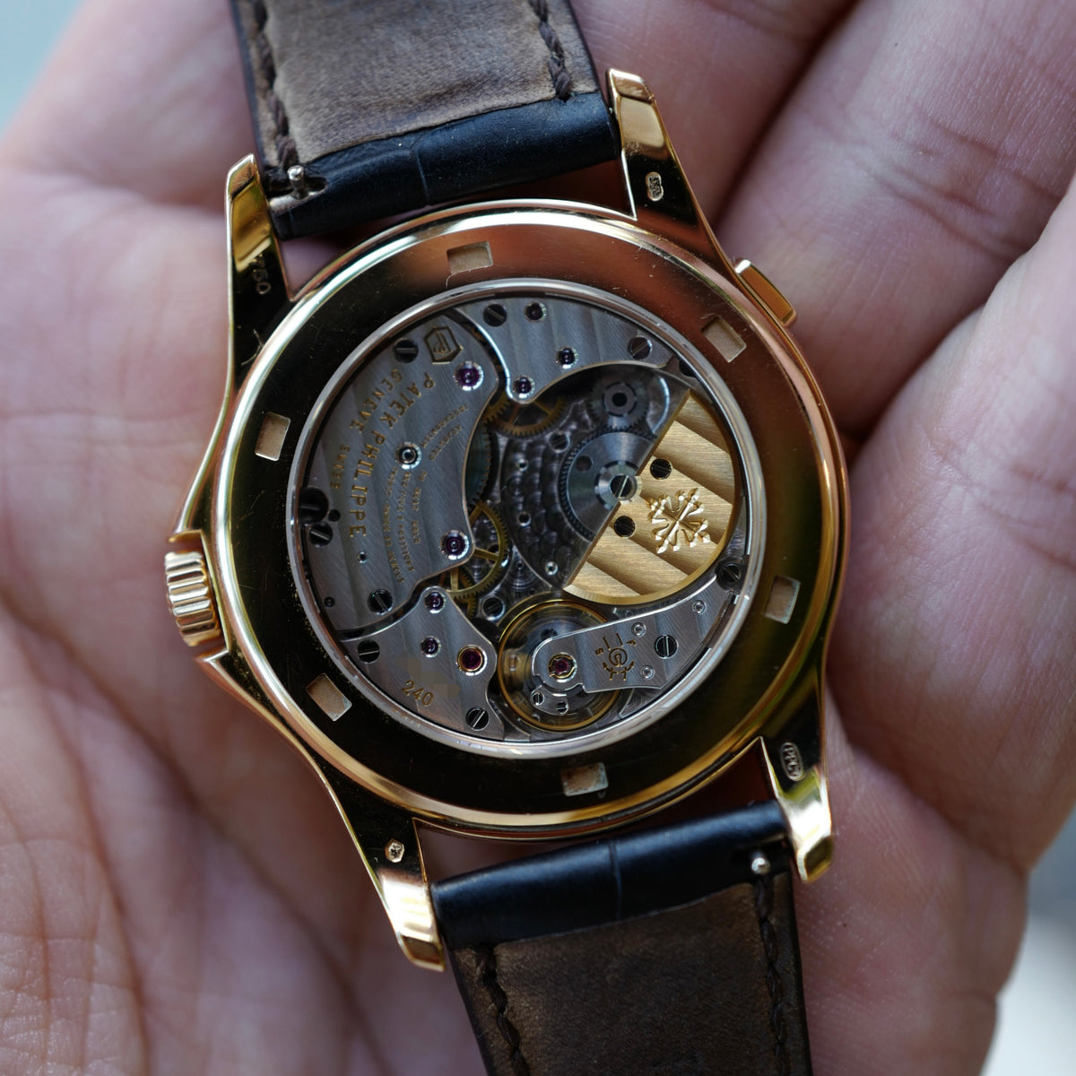 Patek Philippe Pink Gold World Time Ruby Bezel Watch Ref. 5130