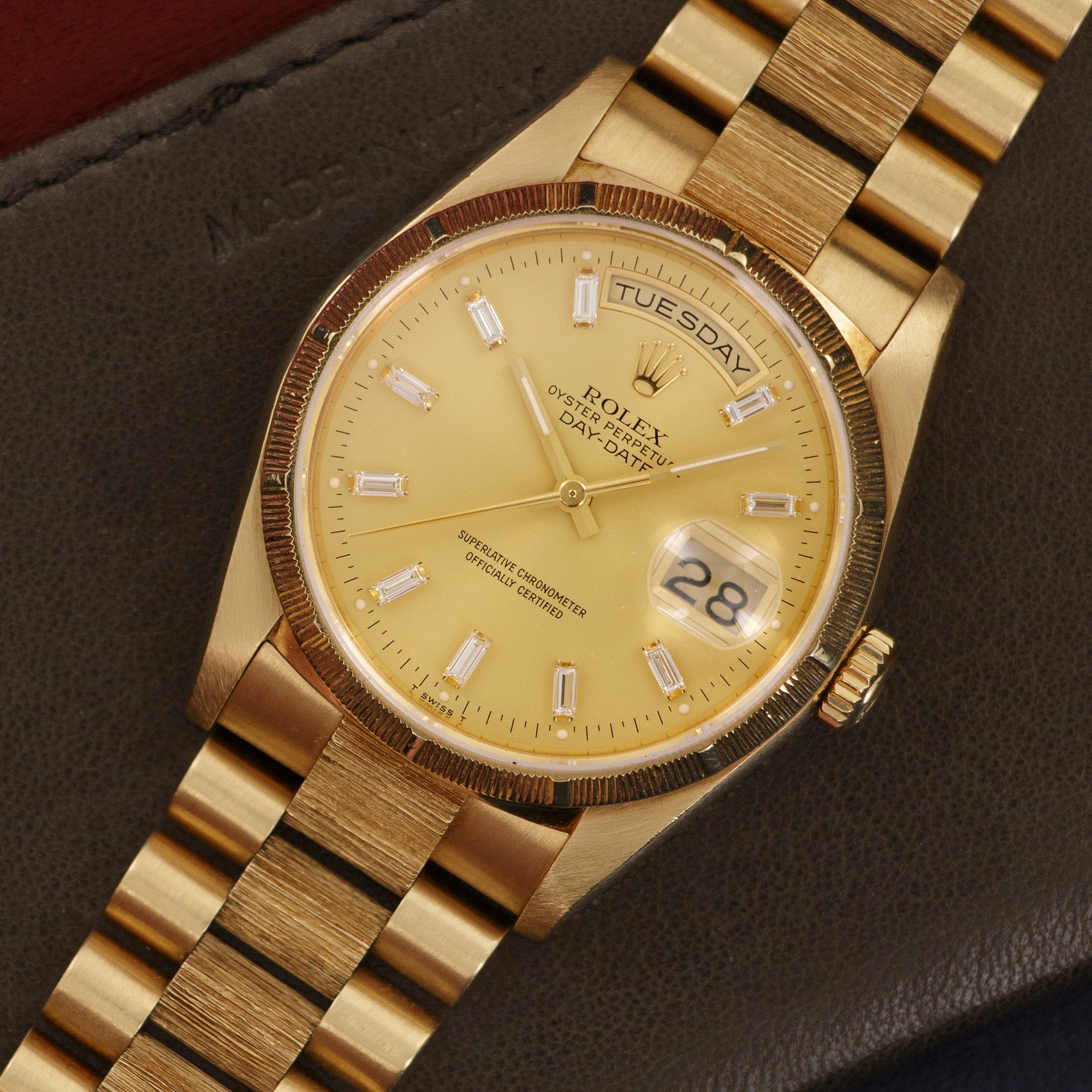 Rolex - Rolex Day-Date Yellow Gold Bark Finish Baguette Diamond Watch Ref. 18248 - The Keystone Watches