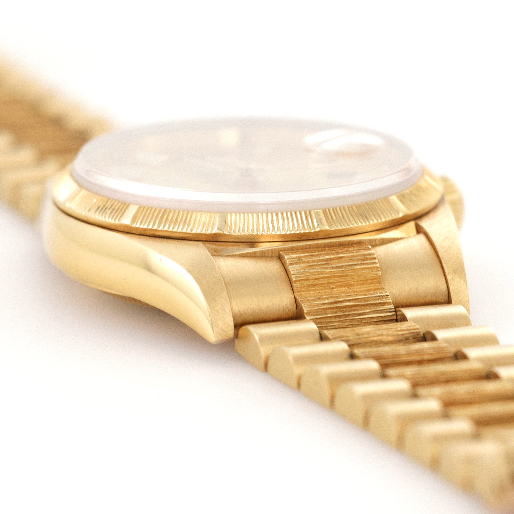 Rolex - Rolex Day-Date Yellow Gold Bark Finish Baguette Diamond Watch Ref. 18248 - The Keystone Watches