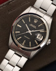 Rolex Steel OysterDate Black Gilt Dial Watch Ref. 6694