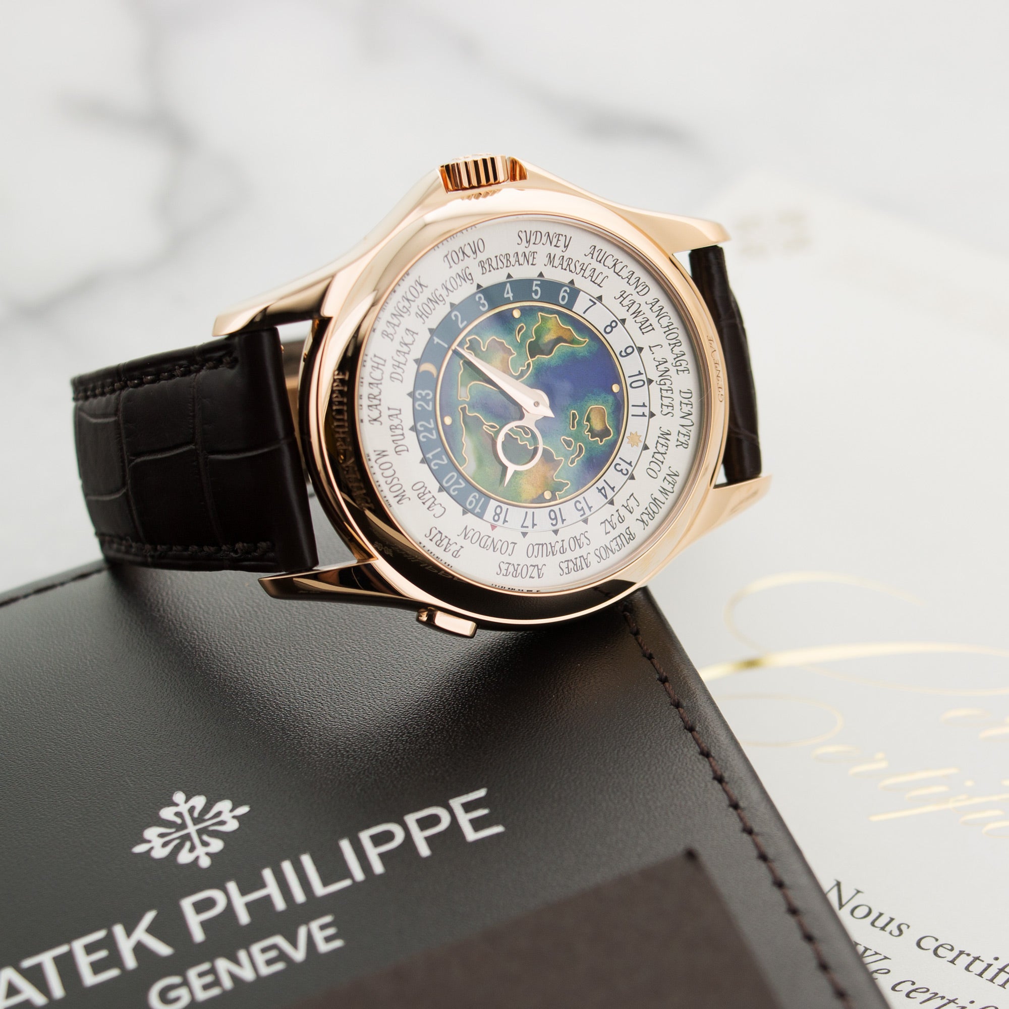 Patek Philippe - Patek Philippe Rose Gold World Time Cloisonne Watch Ref. 5131 - The Keystone Watches