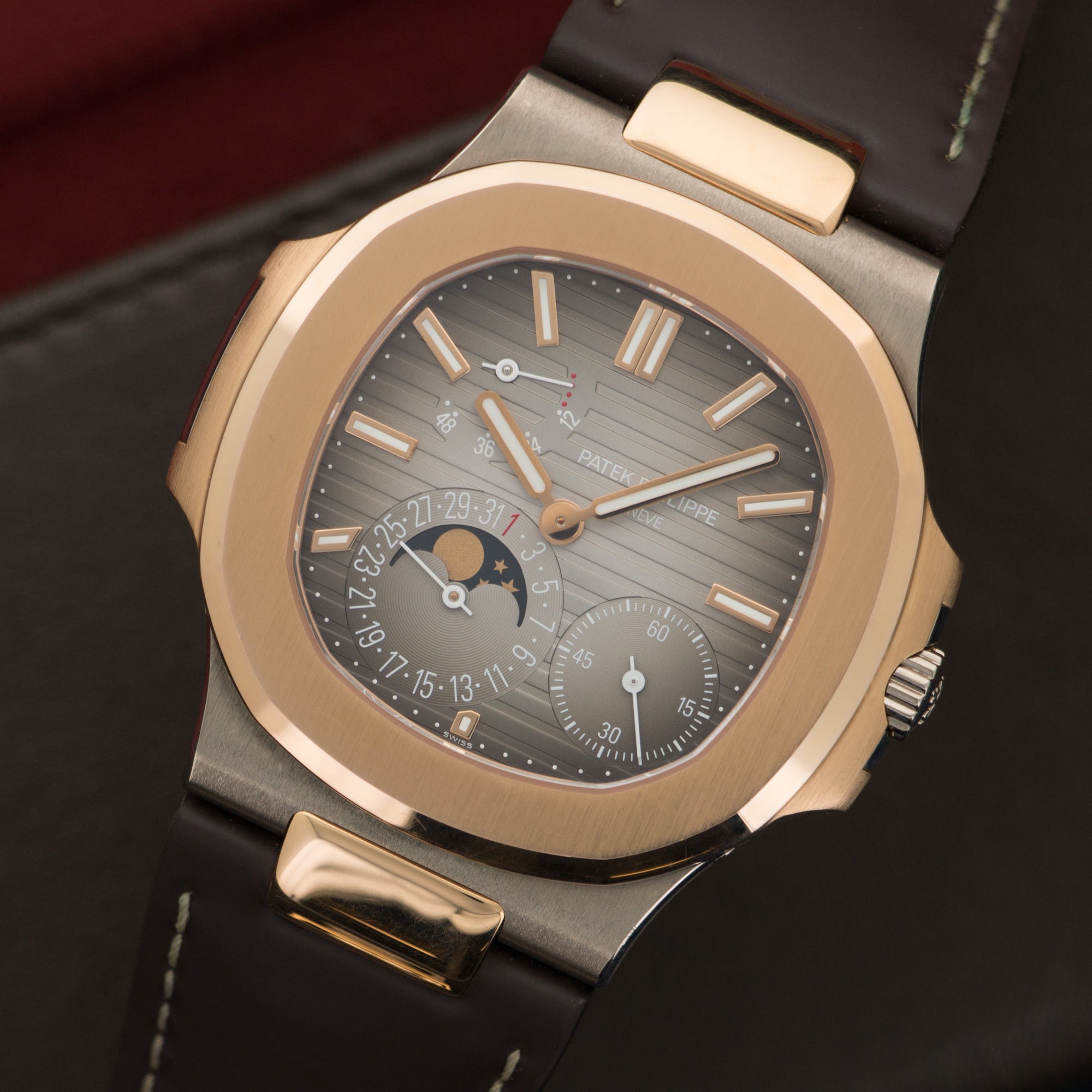 Patek Philippe - Patek Philippe White & Rose Gold Nautilus Moonphase Watch Ref. 5712GR - The Keystone Watches