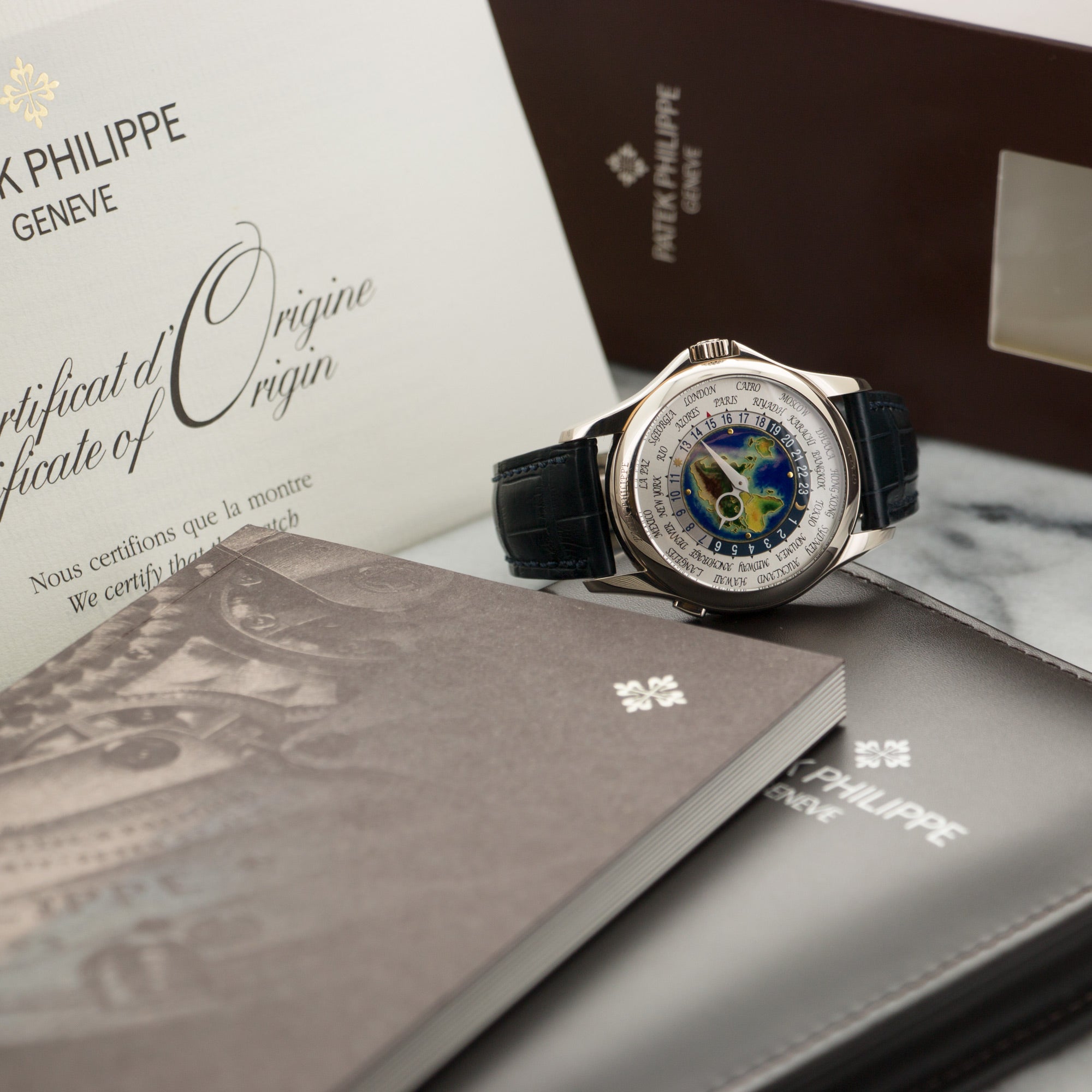 Patek Philippe - Patek Philippe White Gold World Time Cloisonne Watch Ref. 5131 - The Keystone Watches