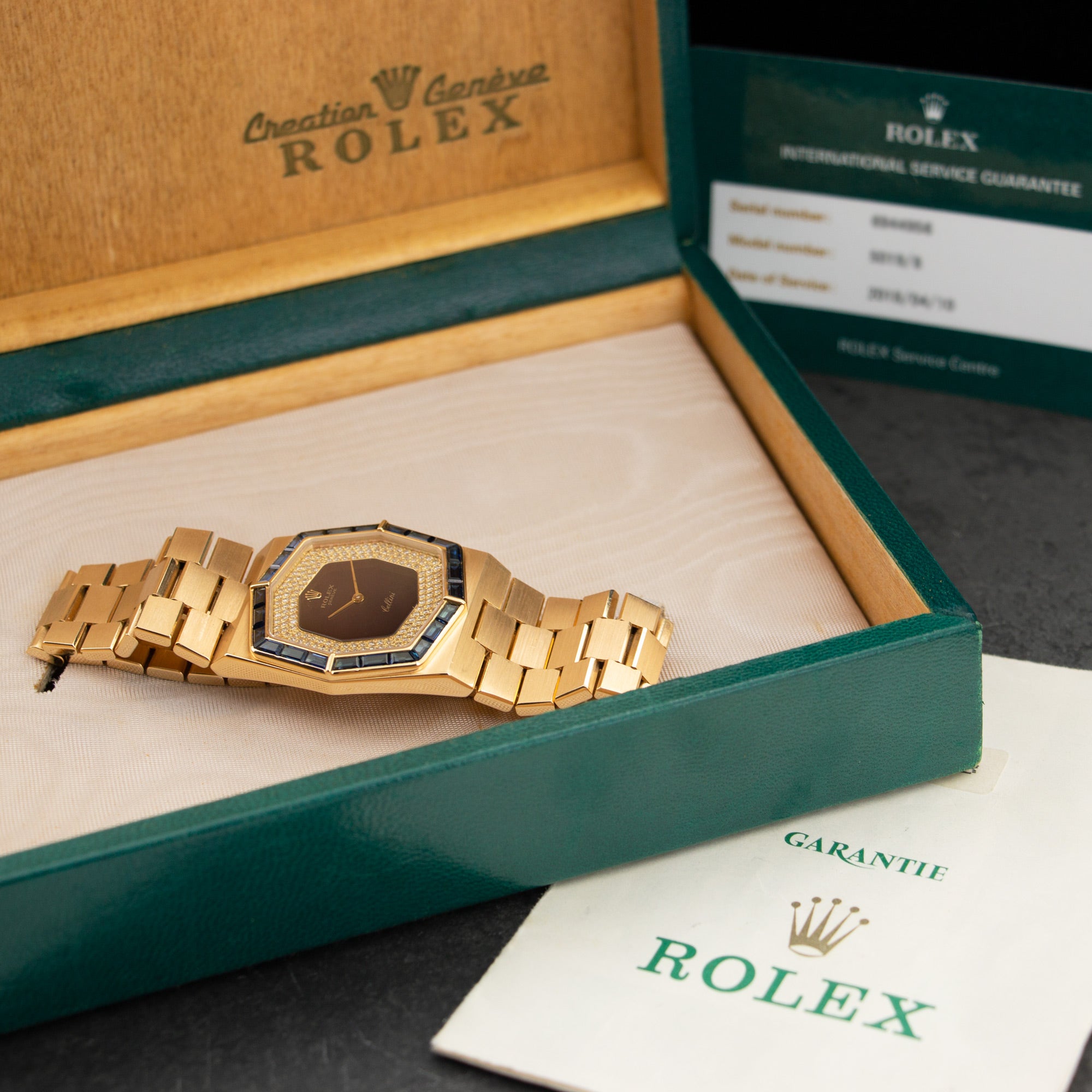 Rolex - Rolex Cellini Yellow Gold with Sapphire Bezen and Diamond Dial Ref. 5019/8 - The Keystone Watches