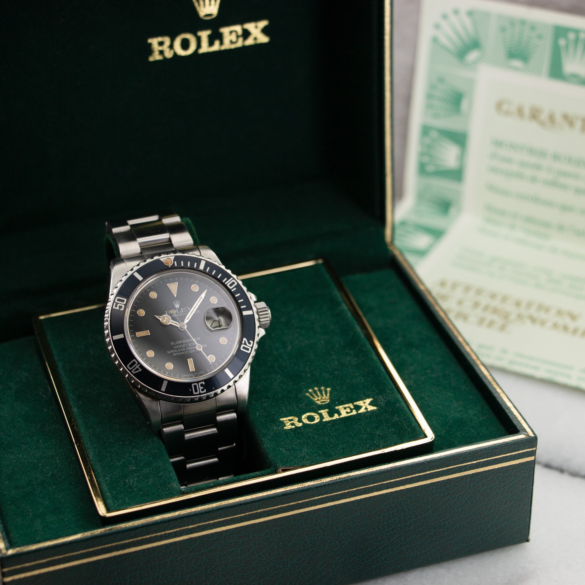 Rolex - Rolex Submariner Watch Ref. 16800 with Original Box and Papers - The Keystone Watches