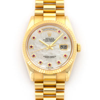 Rolex Yellow Gold Day-Date Mother of Pearl Ruby Watch Ref. 118238
