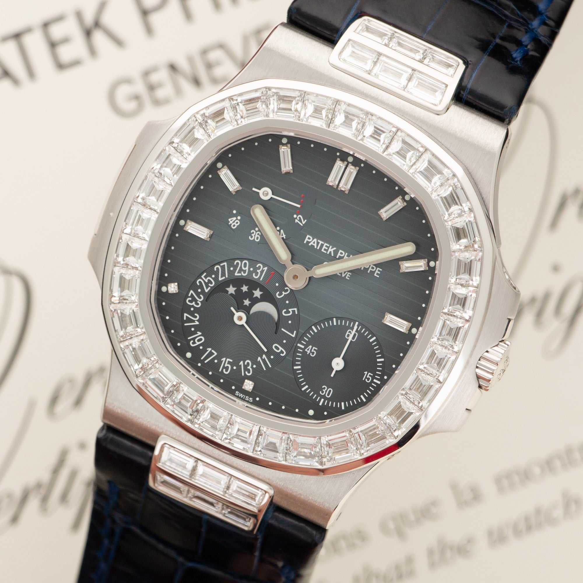 Patek Philippe - Patek Philippe White Gold Nautilus Baguette Diamond Watch Ref. 5724 - The Keystone Watches