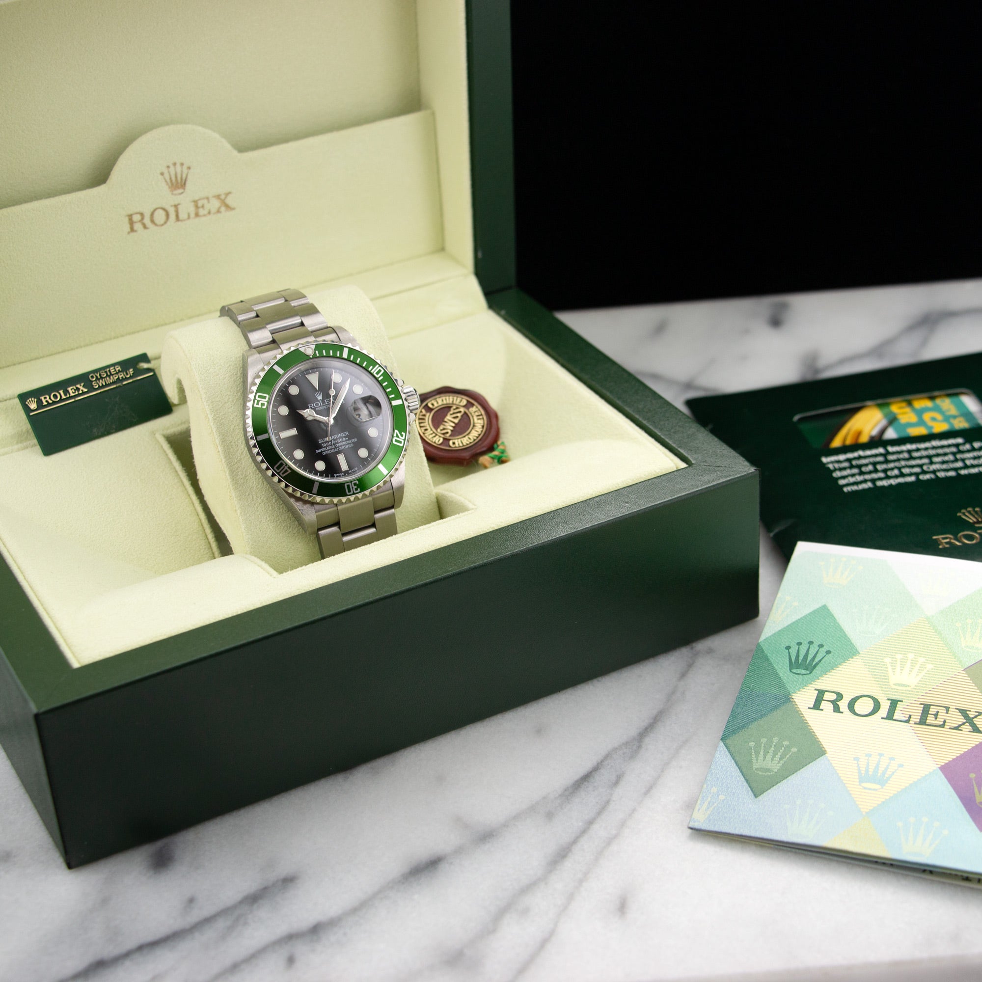Rolex Submariner Flat IV Watch Ref. 16610 with Original Box and Papers