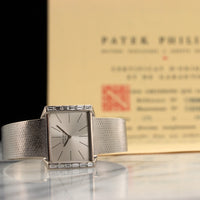Patek Philippe White Gold Baguette Diamond Watch with Original Warranty Paper