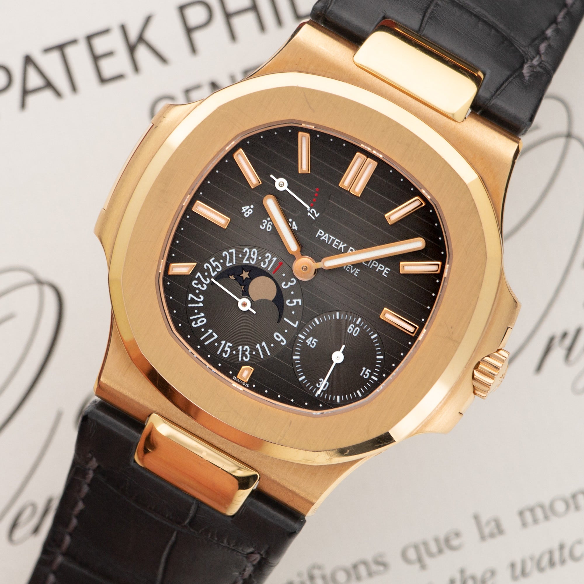 Patek Philippe - Patek Philippe Rose Gold Nautilus Moonphase Watch Ref. 5712 - The Keystone Watches