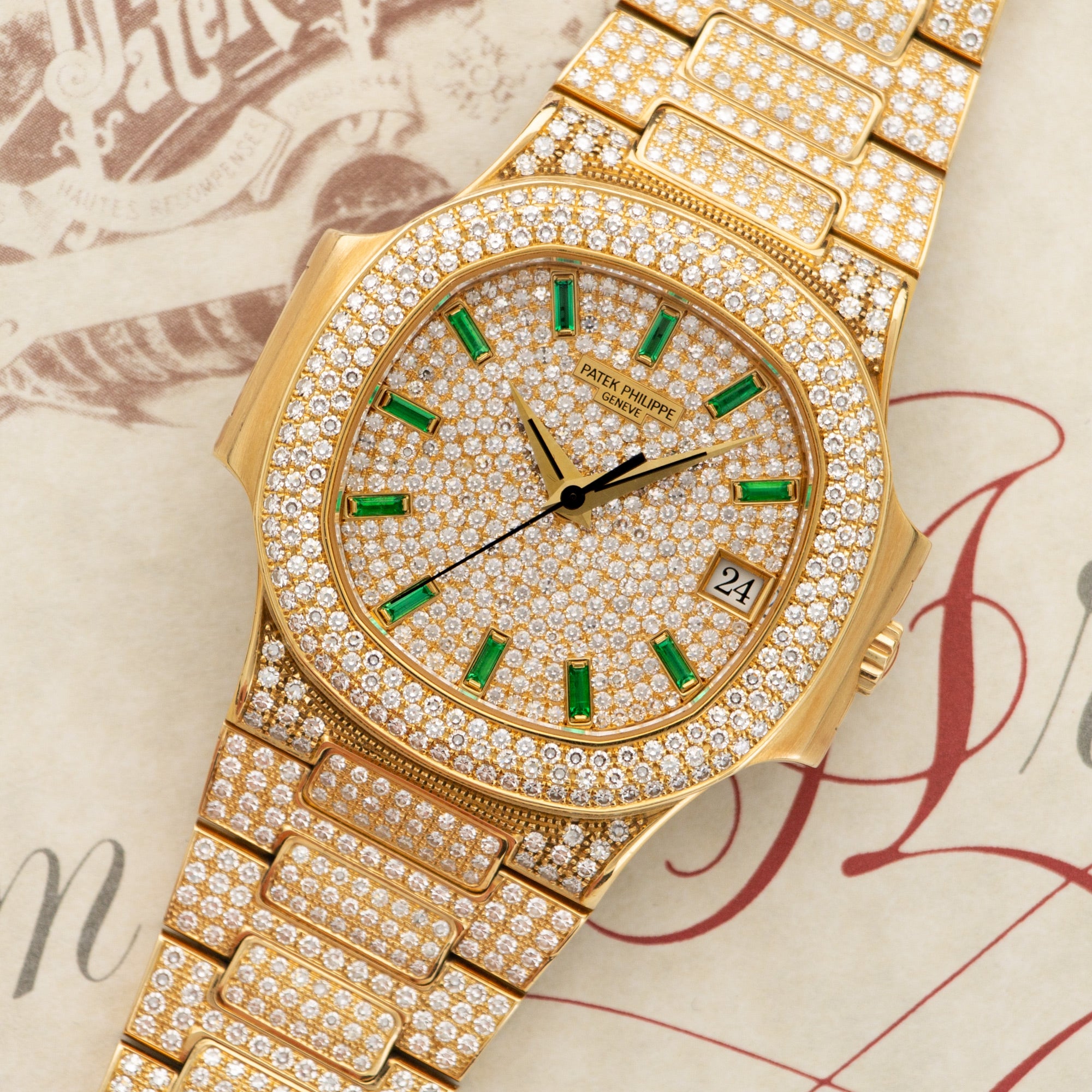 Patek Philippe - Patek Philippe Yellow Gold, Emerald Nautilus Diamond Watch Ref. 3800 - The Keystone Watches