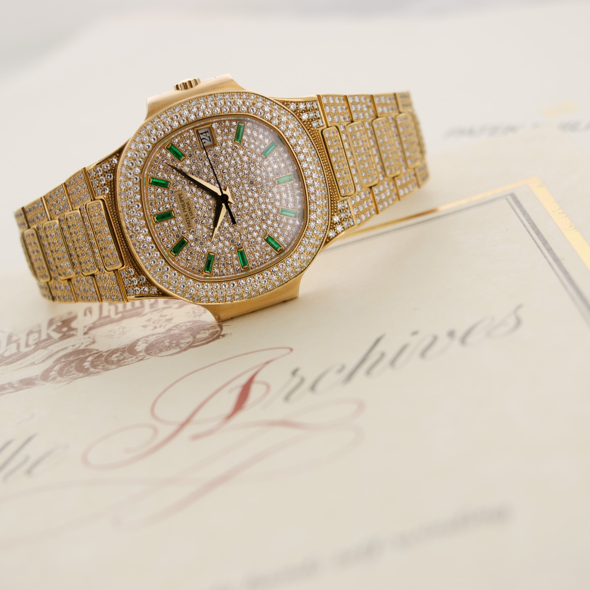 Patek Philippe - Patek Philippe Yellow Gold, Emerald Nautilus Diamond Watch Ref. 3800 - The Keystone Watches