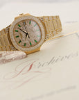 Patek Philippe - Patek Philippe Yellow Gold, Emerald Nautilus Diamond Watch Ref. 3800 - The Keystone Watches