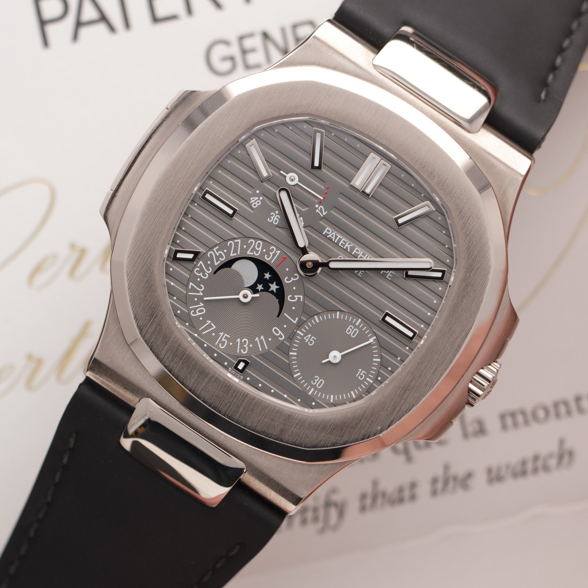 Patek Philippe - Patek Philippe White Gold Nautilus Moonphase Watch Ref. 5712 - The Keystone Watches