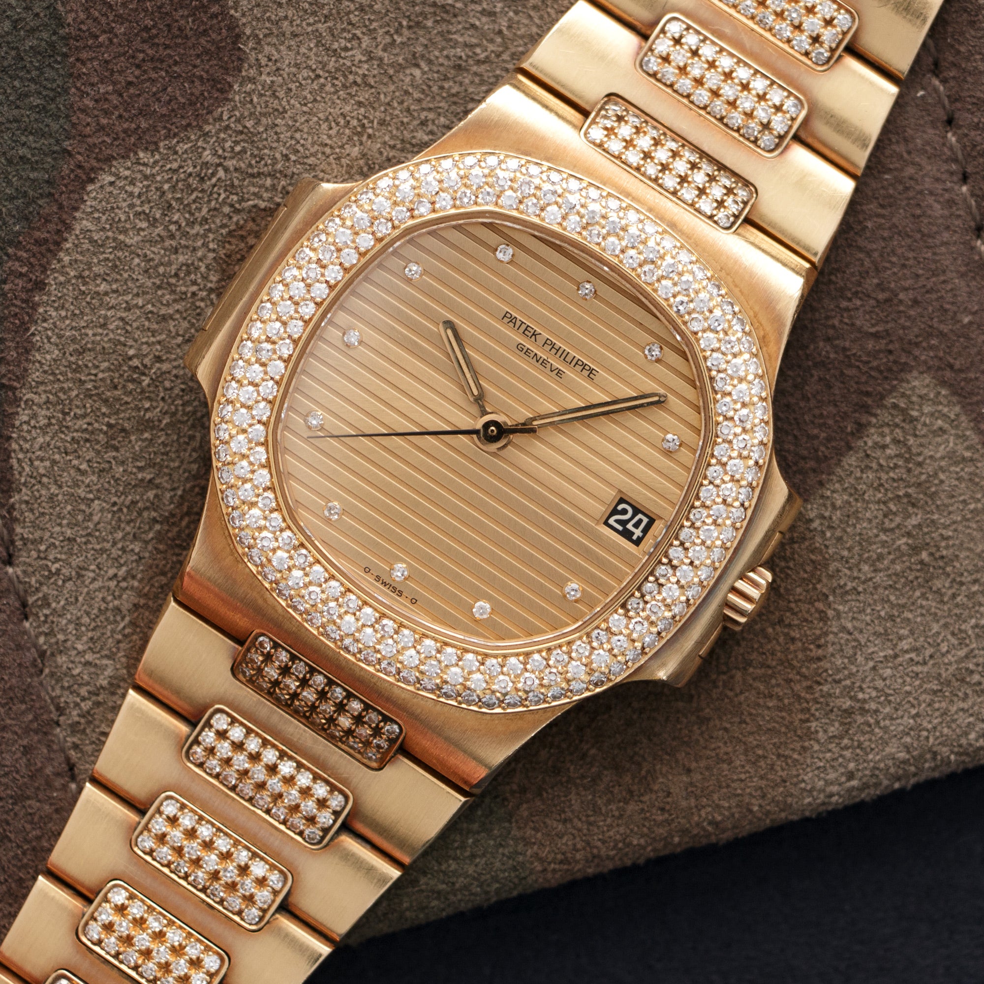 Patek Philippe - Patek Philippe Yellow Gold Nautilus Diamond Watch Ref. 3800 - The Keystone Watches