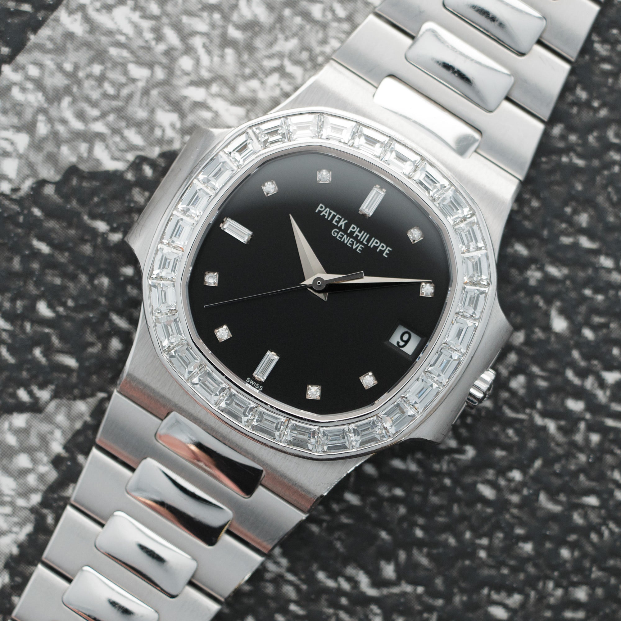 Patek Philippe - Patek Philippe White Gold Nautilus Baguette Diamond Watch Ref. 3800 - The Keystone Watches