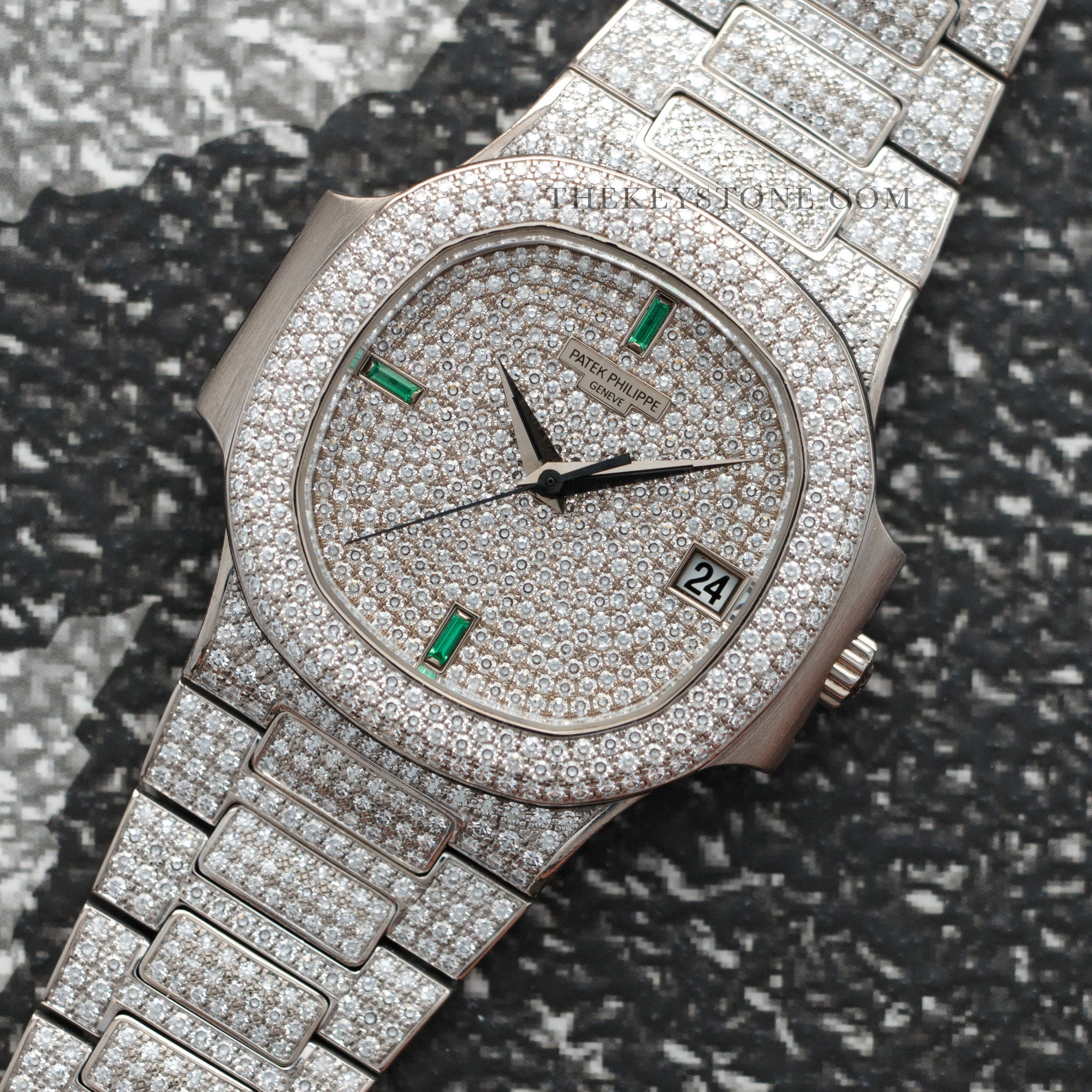 Patek Philippe - Patek Philippe White Gold Nautilus Diamond Emerald Watch Ref. 3800 - The Keystone Watches