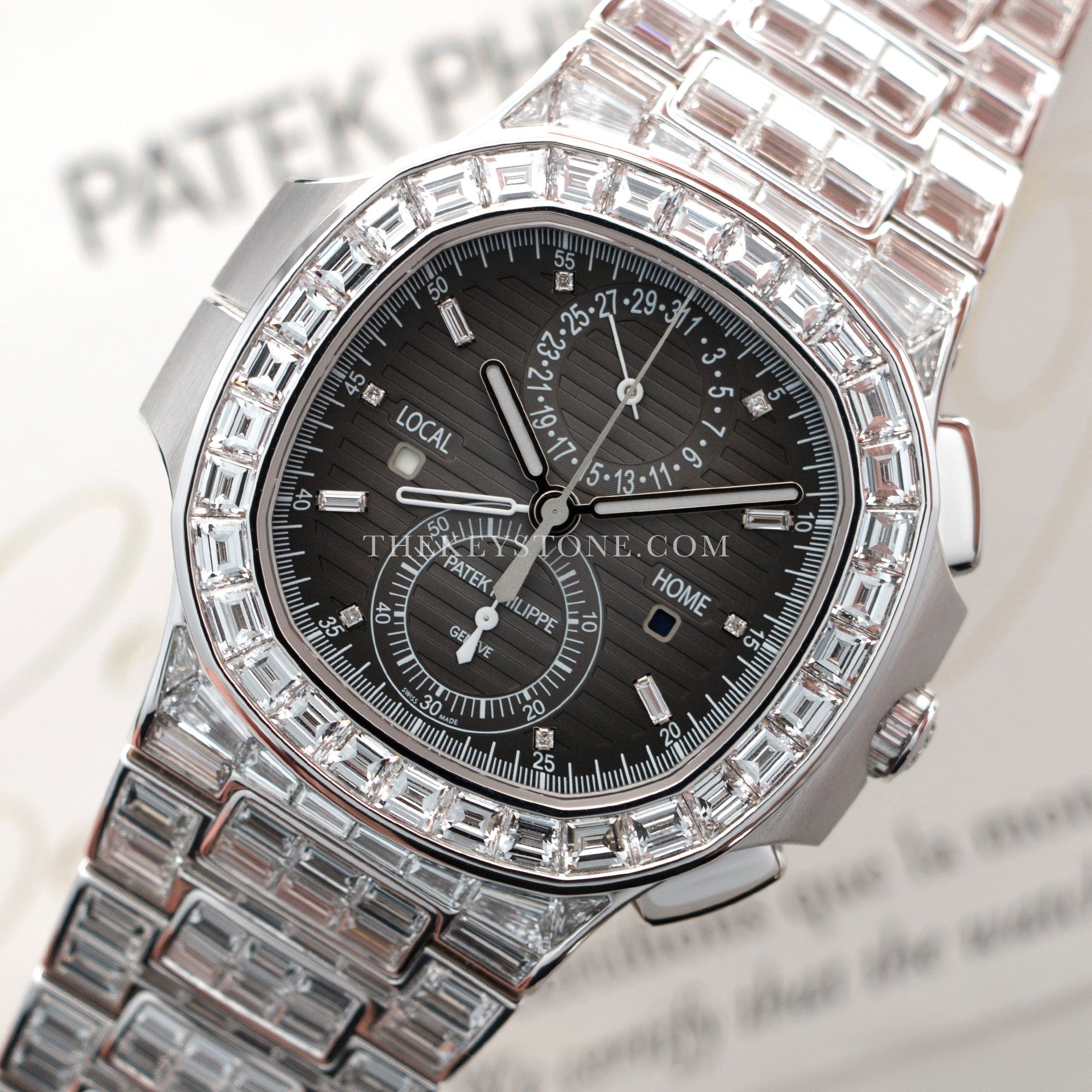 Patek Philippe - Patek Philippe White Gold Nautilus Baguette Diamond Watch Ref. 5990, Special Edition - The Keystone Watches
