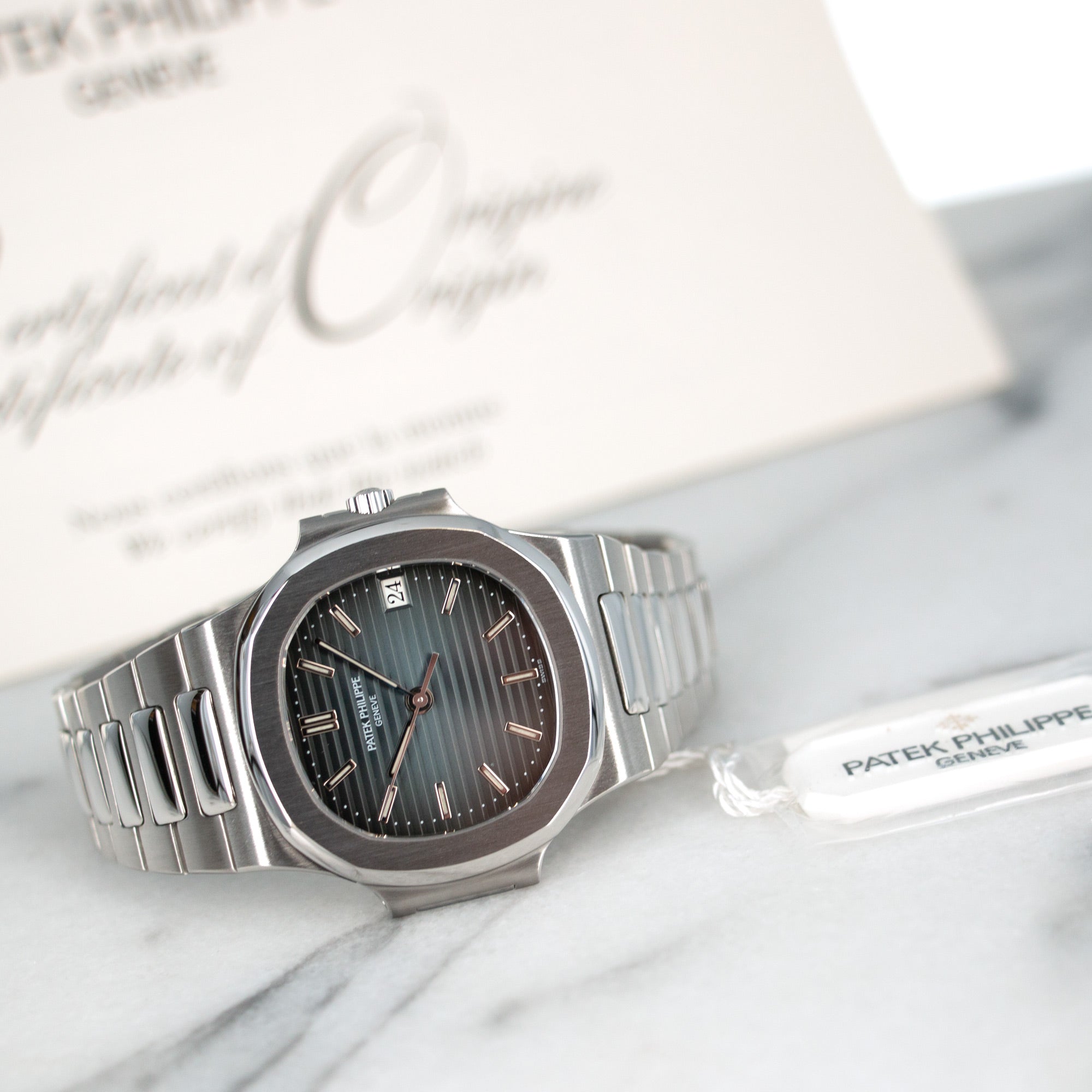 Patek Philippe - Patek Philippe Nautilus, Ref. 3800 with Original Paper and Hangtag - The Keystone Watches