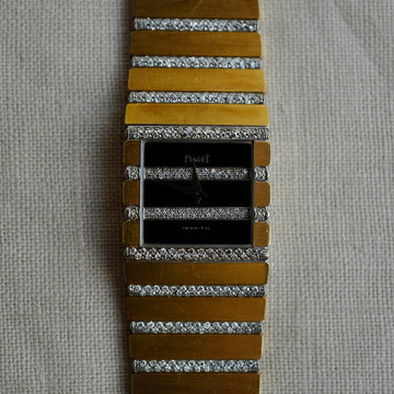 Piaget White Gold and Yellow Gold Watch with Black and Diamond Dial Ref. 7131