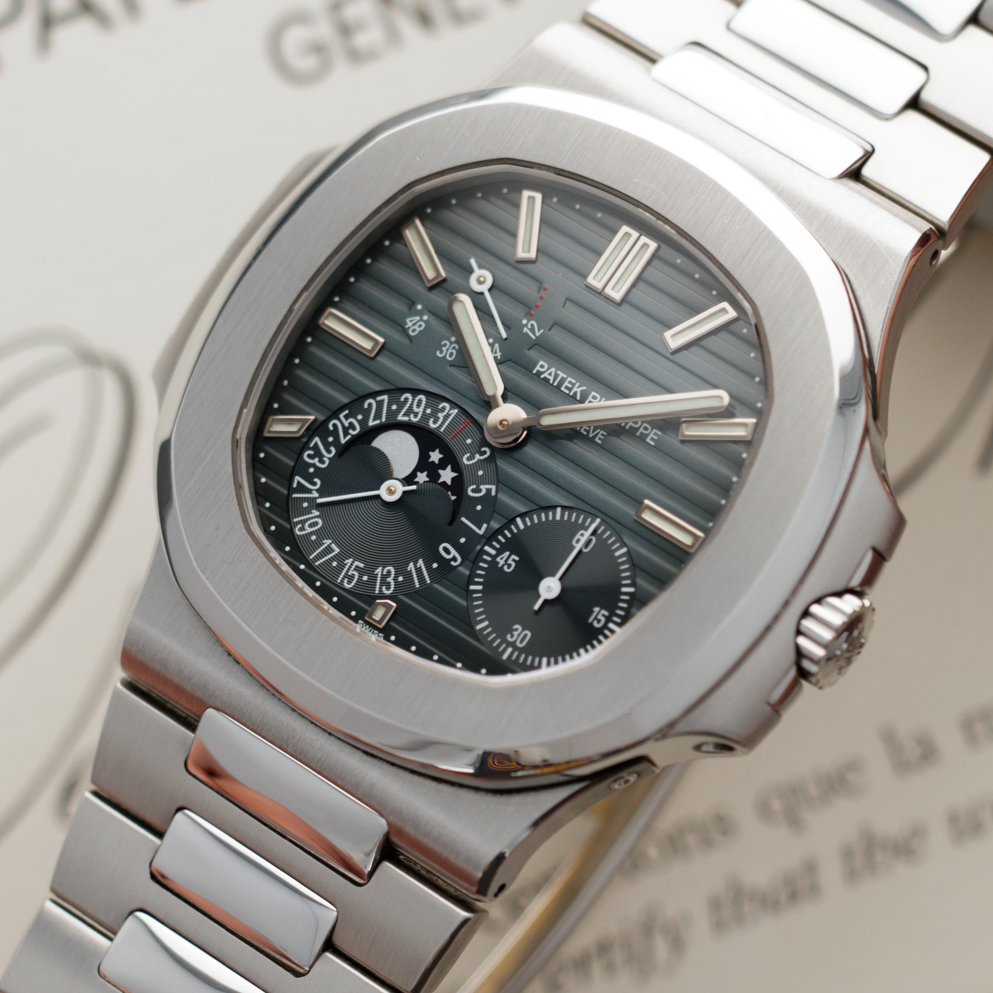 Patek Philippe - Patek Philippe Nautilus Moonphase Watch Ref. 5712 with Original Box and Papers - The Keystone Watches