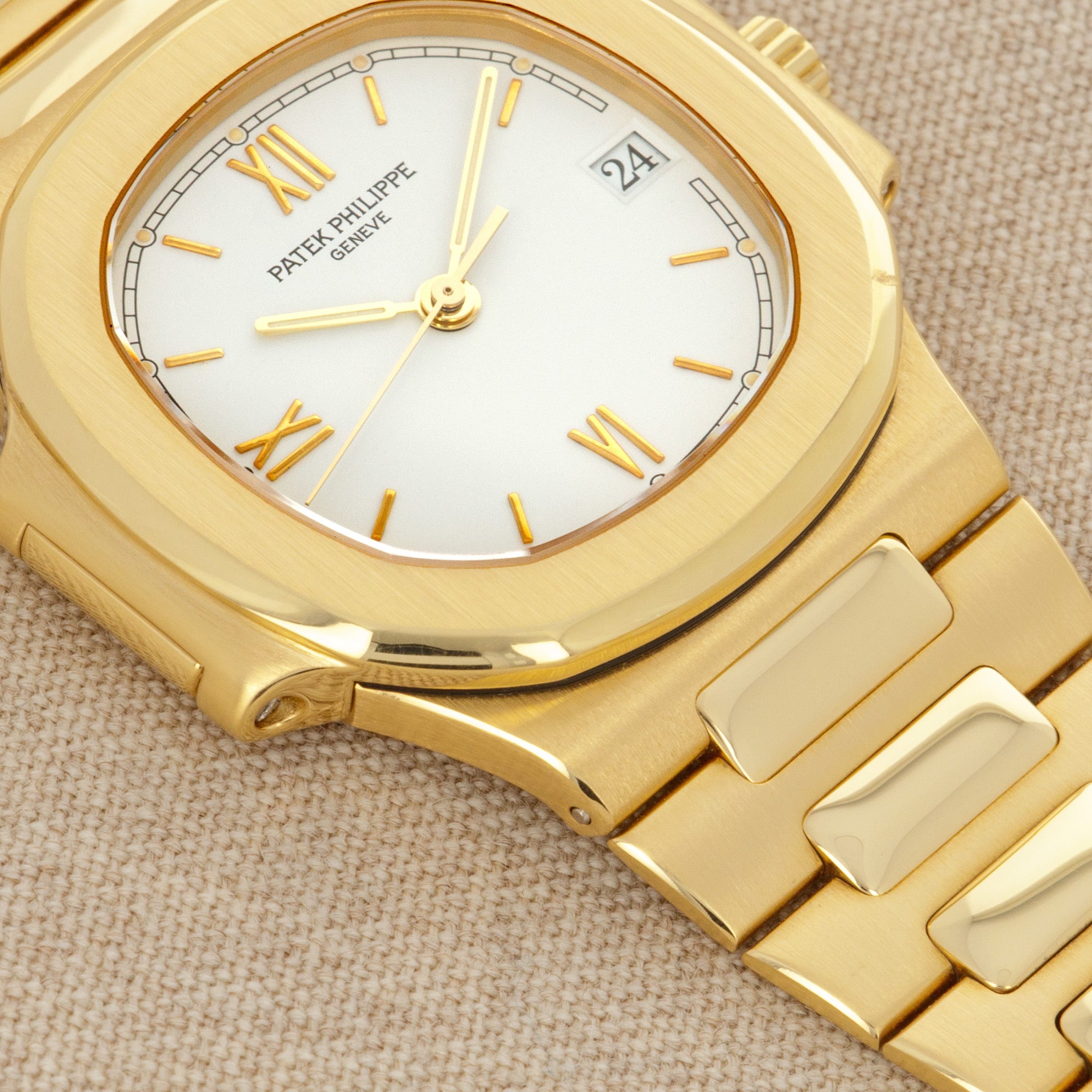 Patek Philippe - Patek Philippe Yellow Gold Nautilus Watch Ref. 3800 with Rare White Roman Numerals Dial - The Keystone Watches
