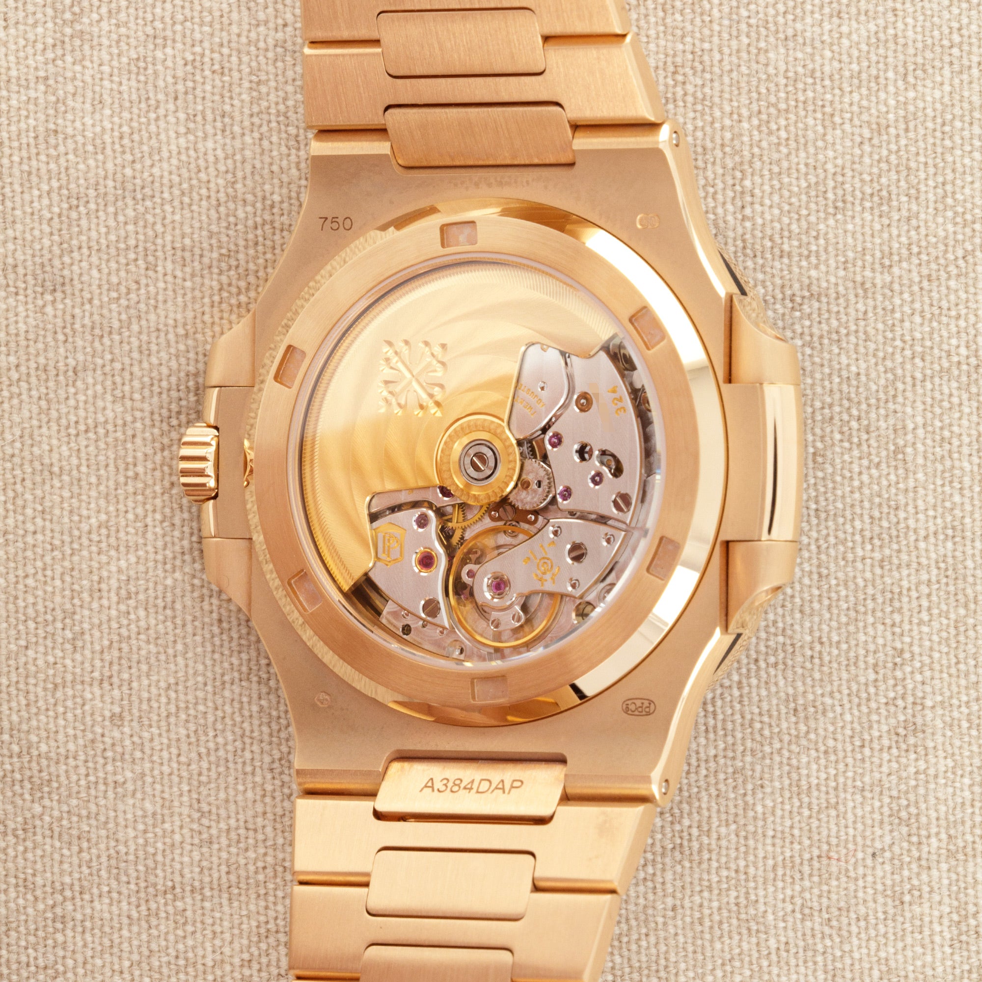 Patek Philippe - Patek Philippe Rose Gold Nautilus Watch Ref. 5723 with Factory Ruby Dial and Bezel - The Keystone Watches