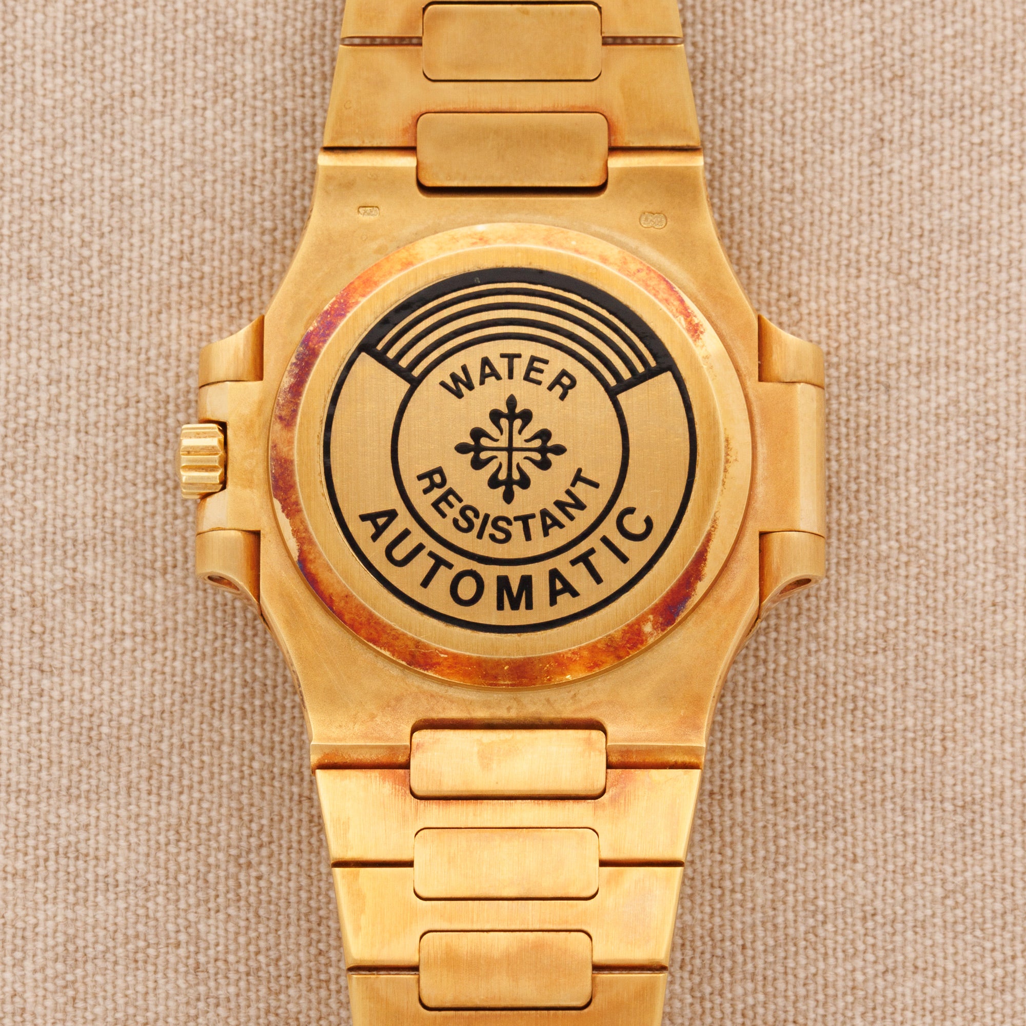 Patek Philippe - Patek Philippe Yellow Gold Nautilus Ref. 3800 with Factory Diamond and Ruby Dial - The Keystone Watches