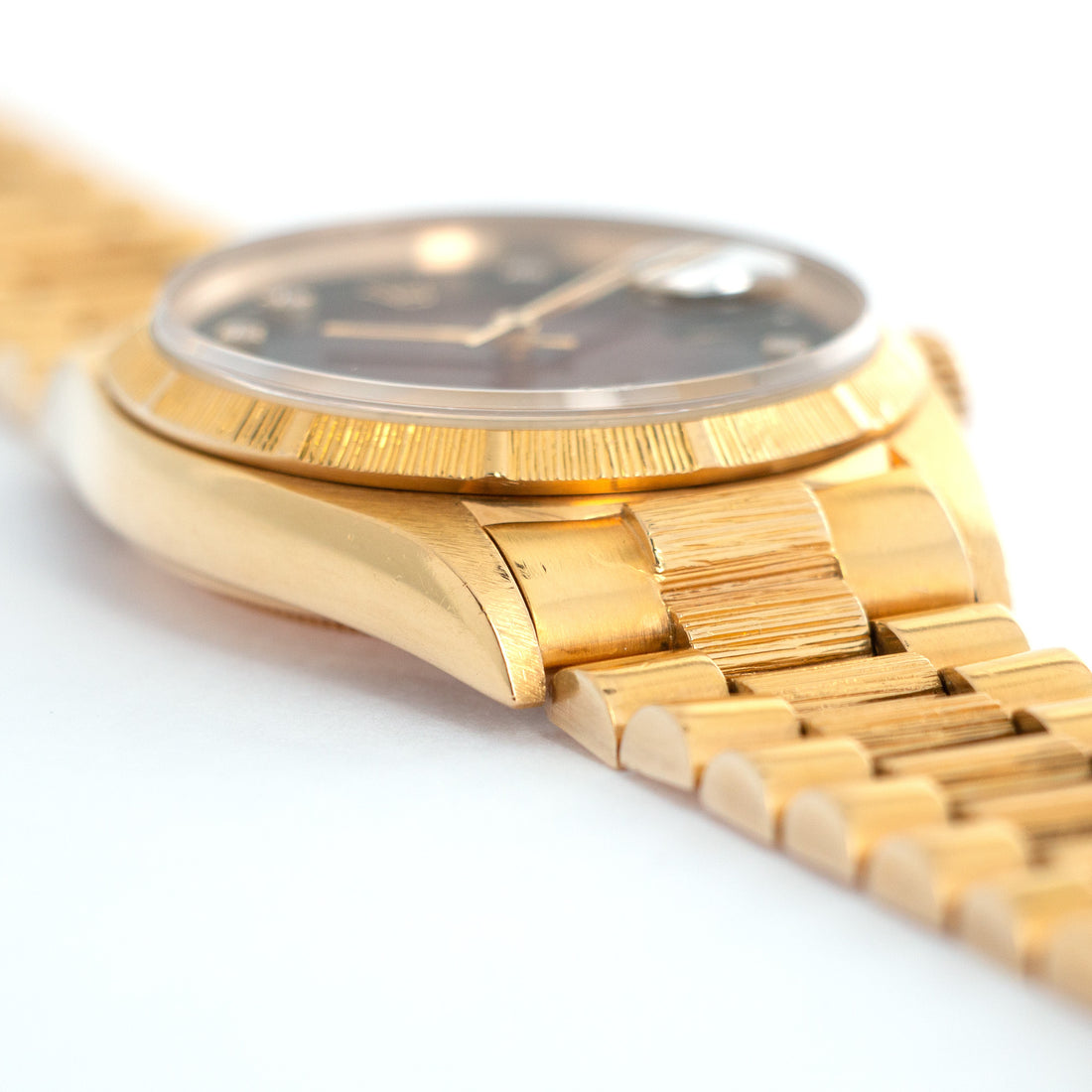 Rolex Yellow Gold Day-Date Ref. 16078 with Red Vignette Dial