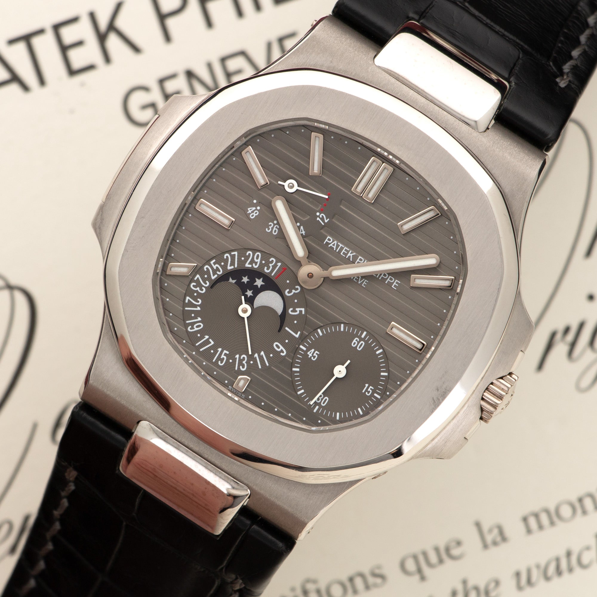 Patek Philippe - Patek Philippe White Gold Nautilus Moonphase Watch Ref. 5712 - The Keystone Watches