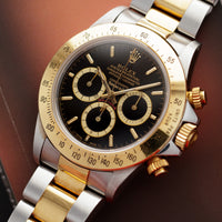 Rolex Daytona 16523 Two-Tone  Original Condition, Some Hairline Scratches Consistent with Age Unisex Two-Tone Black Floating Dial with Tiffany & Co. Stamp 40 mm Automatic 1989/1991 Two-Tone Bracelet Handmade Travel Pouch 