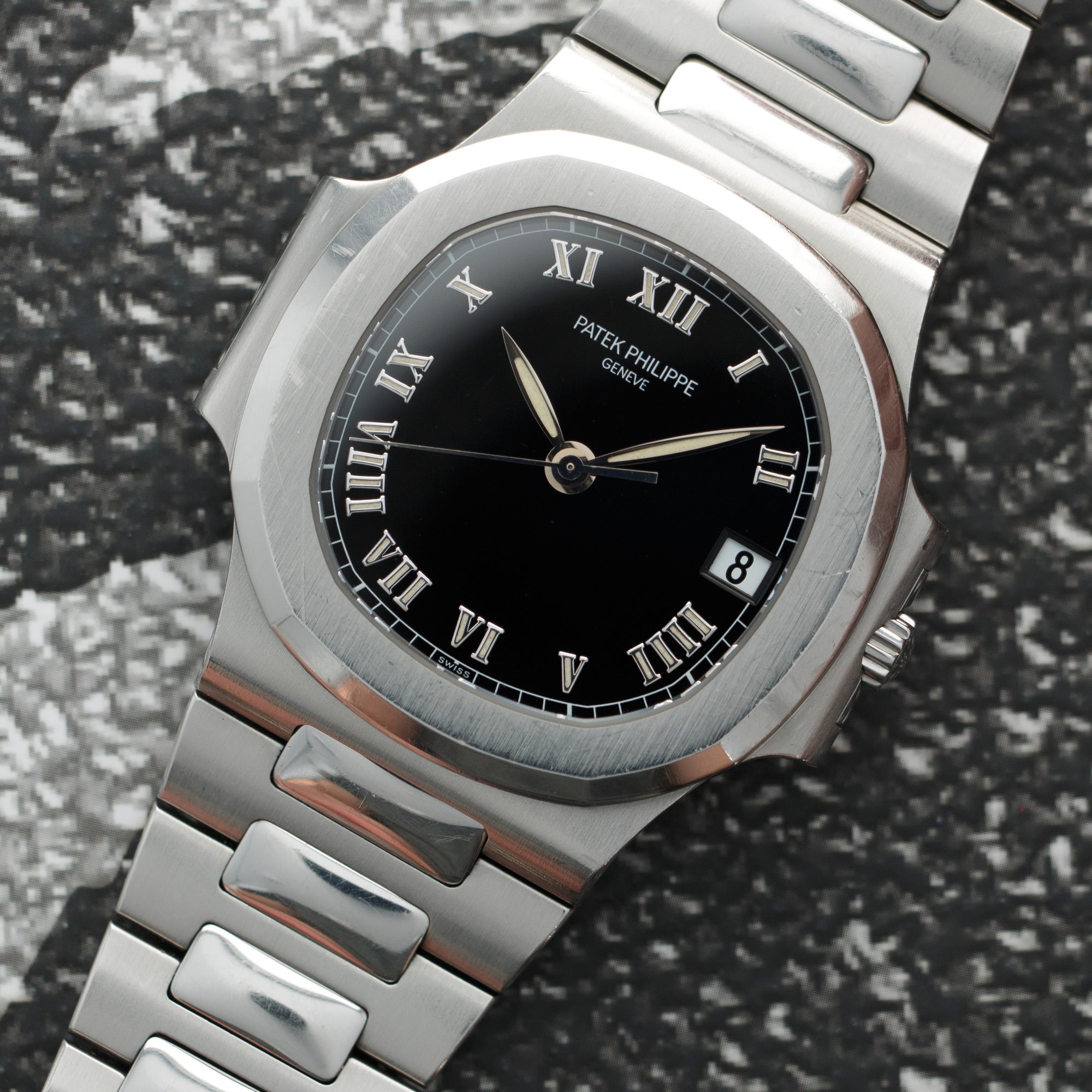 Patek Philippe - Patek Philippe Nautilus Ref. 3800 with Black Roman Numeral Dial - The Keystone Watches