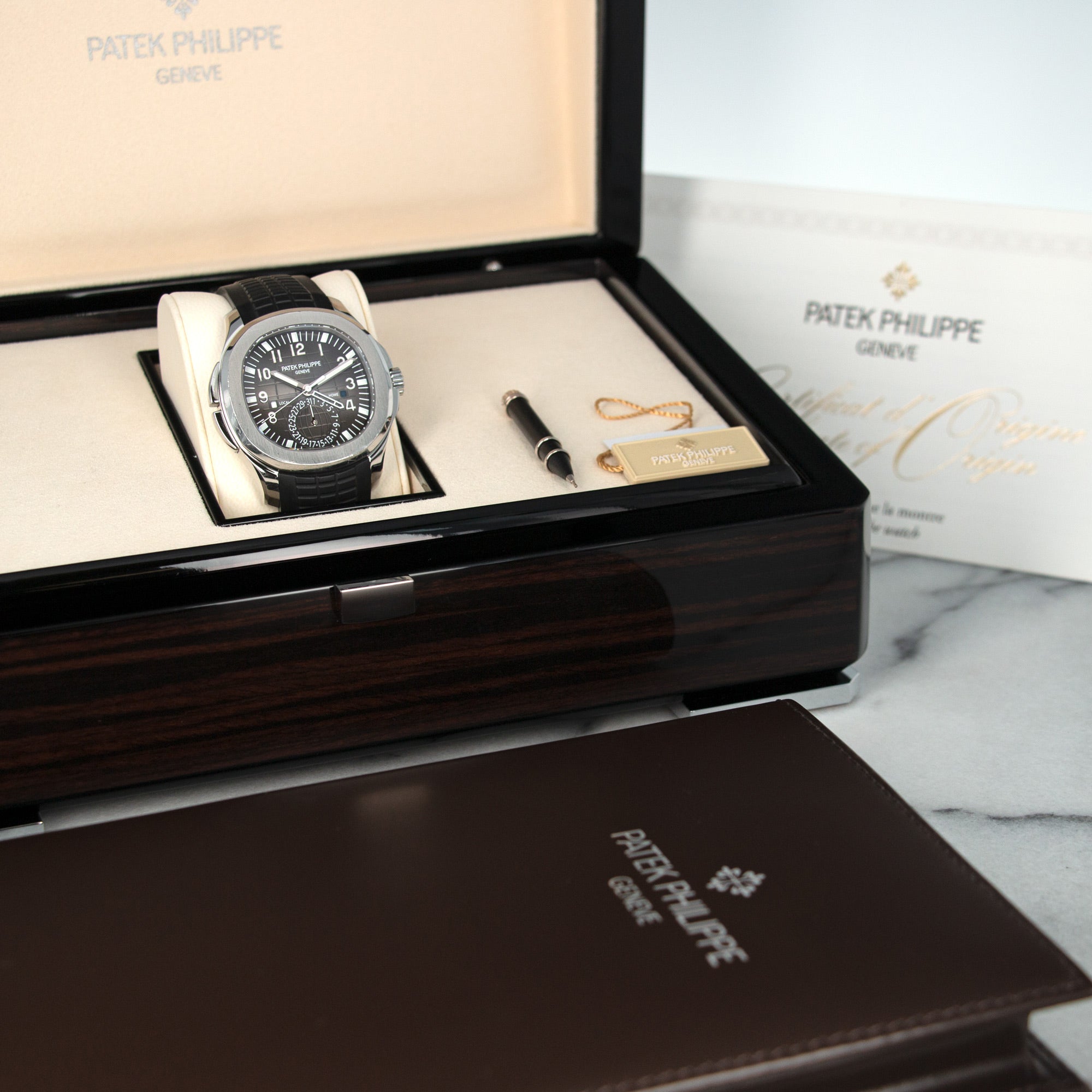Patek Philippe - Patek Philippe Aquanaut Travel Time Watch Ref. 5164 - The Keystone Watches