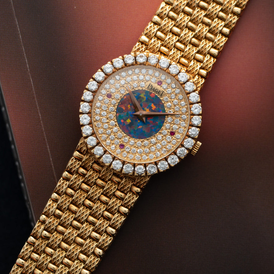 Piaget Yellow Gold Watch with Diamond Bezel and Opal, Diamond and Ruby Dial