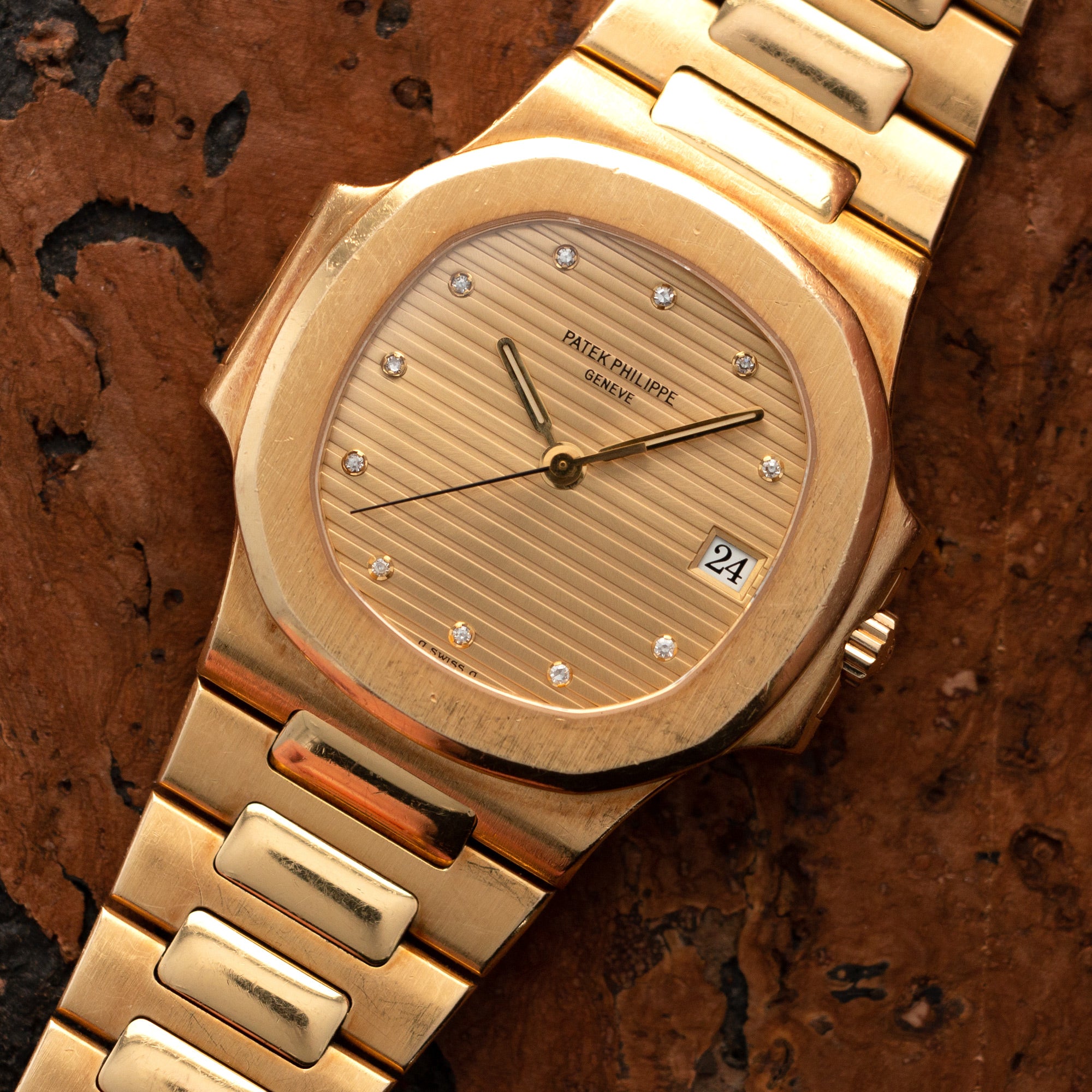 Patek Philippe - Patek Philippe Nautilus Yellow Gold diamond dial ref. 3800/1 - The Keystone Watches