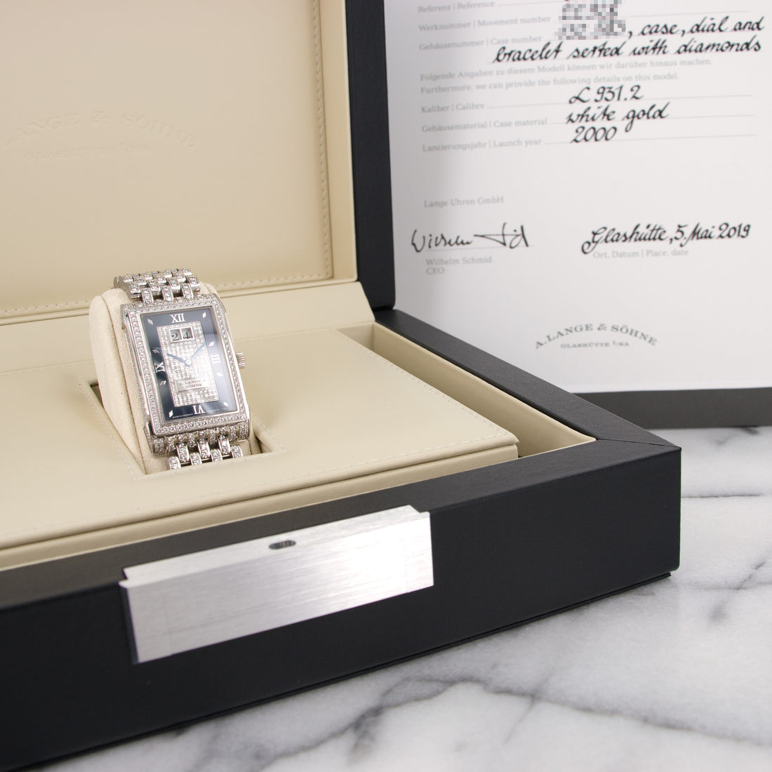 A. Lange & Sohne Cabaret 868.032 18k WG  Signs of Average Wear, Original Finish Unisex 18k WG Blue with Pave Diamonds 27 X 35mm Manual 2000 White Gold with Original Pave Diamonds Original Box and Archival Extract Paper 