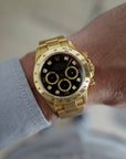 Rolex Daytona 16528G 18k YG  Excellent Overall Condition, No Notable Signs of Wear Unisex 18k YG Black with Diamond Markers 40 mm Automatic 1994/5 Yellow Gold Original Warranty Paper 